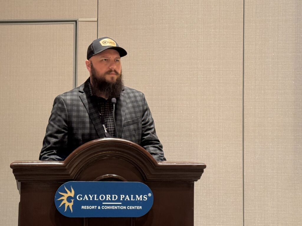 Tom Curee, president og Qued