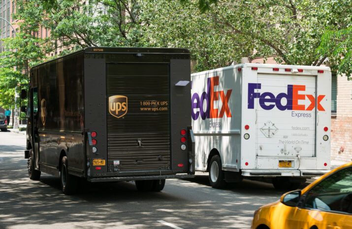UPS and FedEx vehicles.