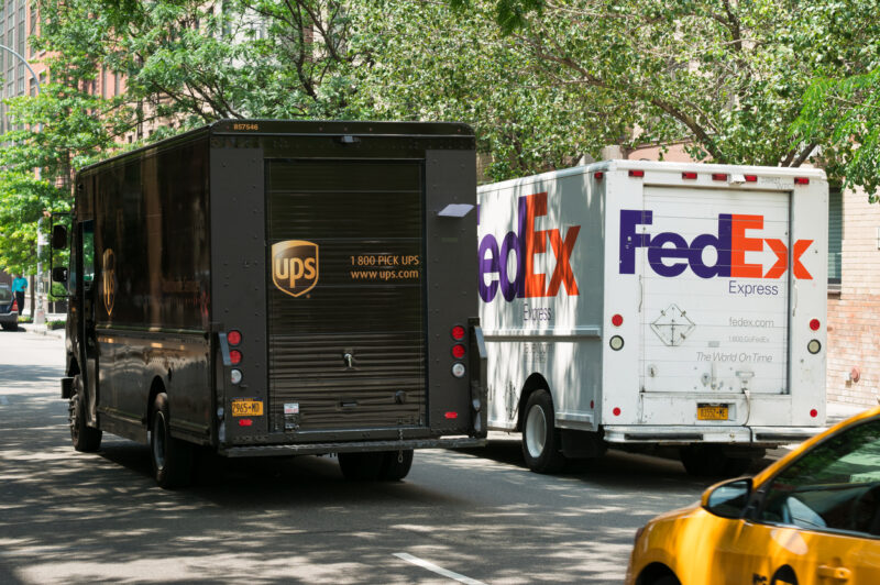 UPS and FedEx vehicles.