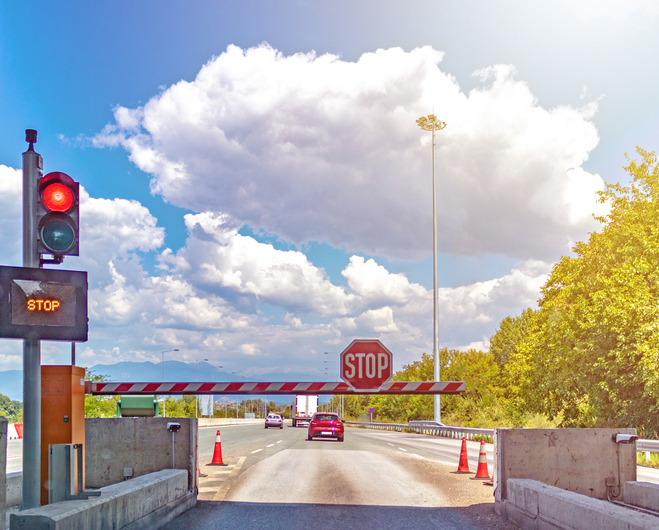 Picture of an automatic barrier at a toll booth