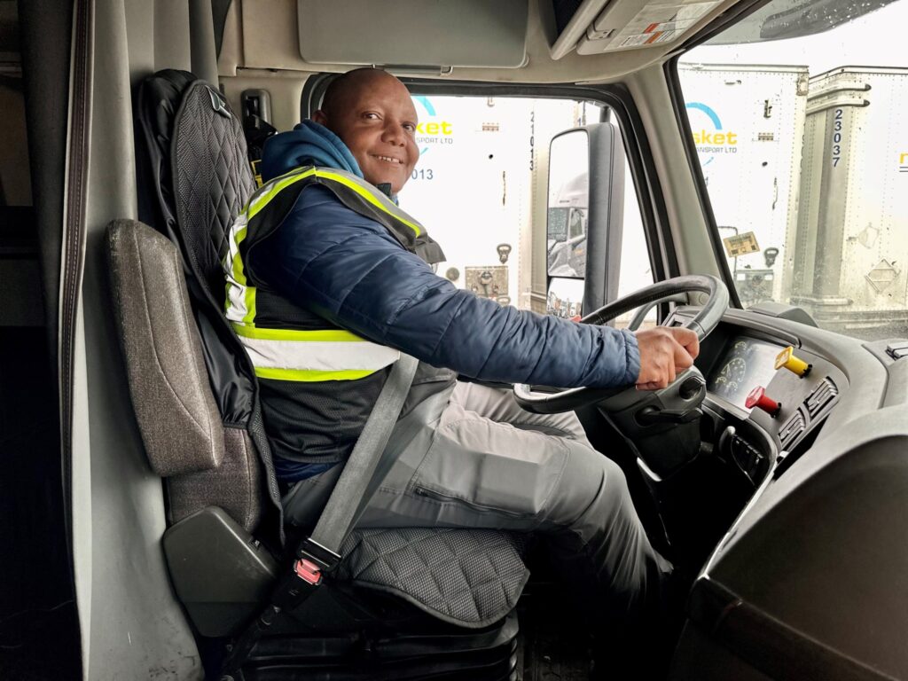 Daniel Wanyeki in truck cab