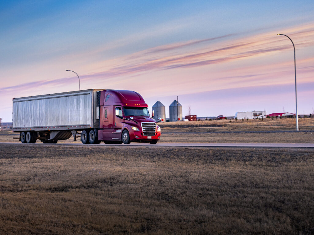 Semi Truck On the Rural Trans-Canada Highway at sunset.