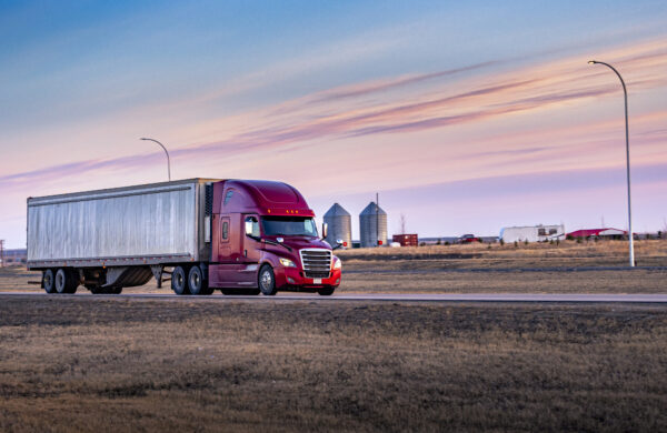 Semi Truck On the Rural Trans-Canada Highway at sunset.