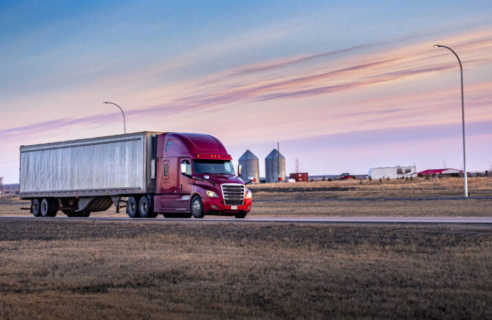 Semi Truck On the Rural Trans-Canada Highway at sunset.