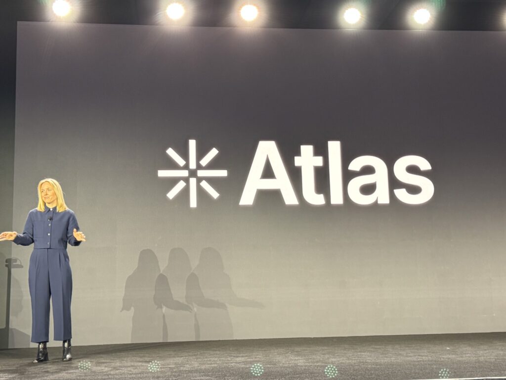 Emily Parsosns on stage presenting Atlas