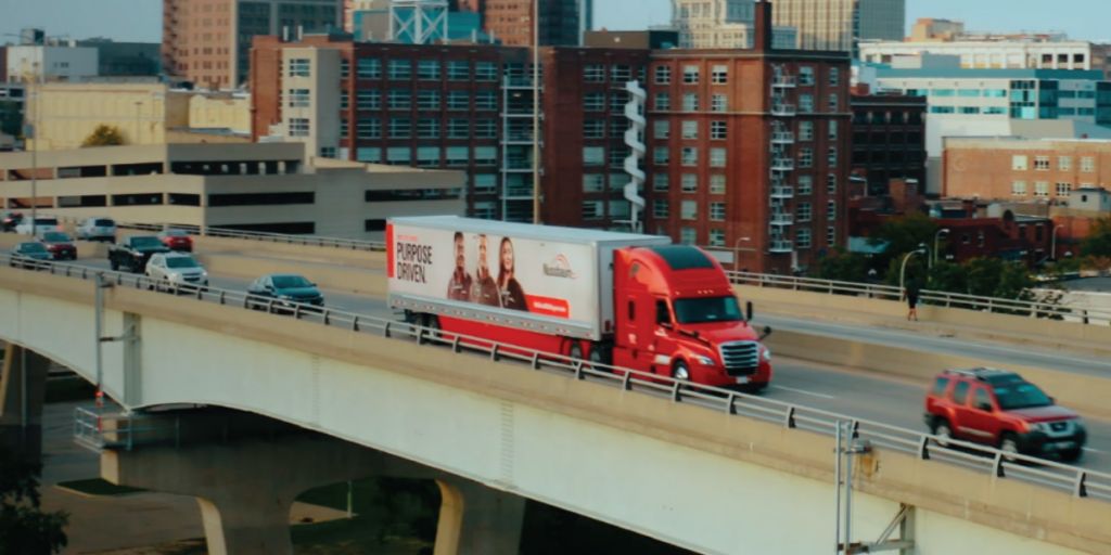 Truck moves along an overpass