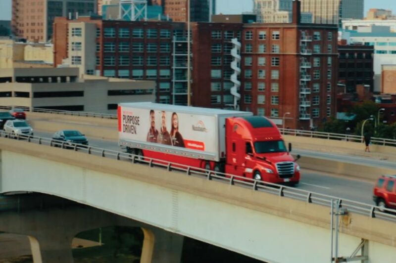Truck moves along an overpass