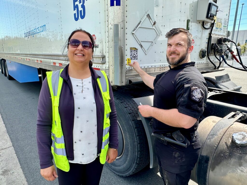 Orinder Pal Sandhar and a police officer