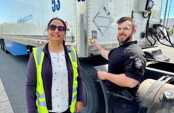 Orinder Pal Sandhar and a police officer