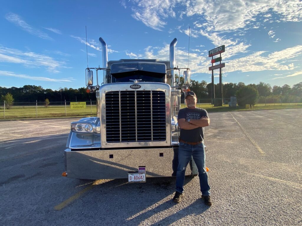 Picture of Richard Munkittrick in front of his truck