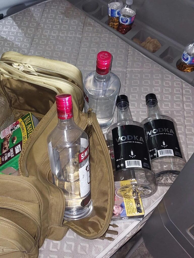 Vodka bottles found in truck's cab