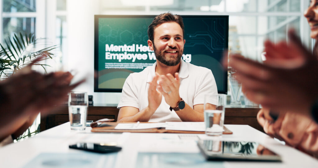 HR meeting and mental wellbeing with business people in boardroom of office