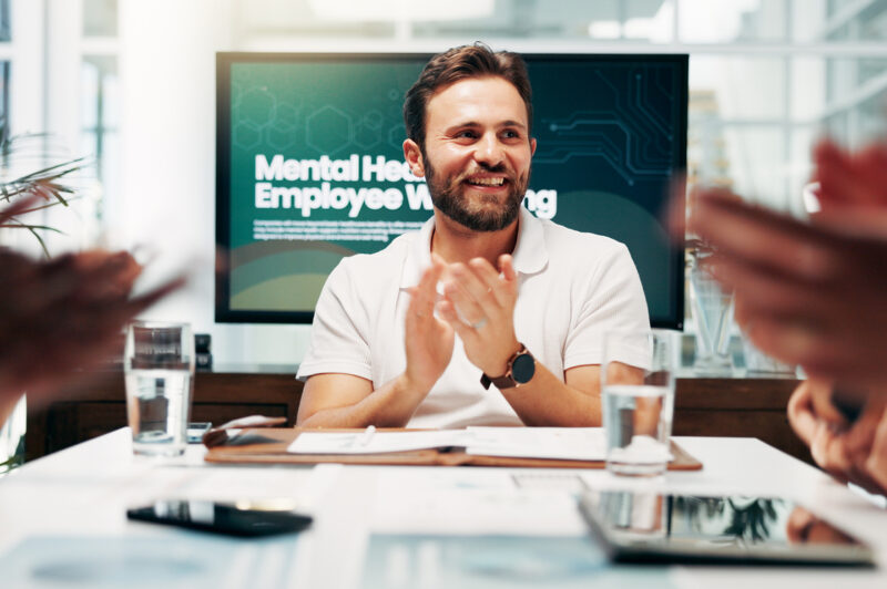 HR meeting and mental wellbeing with business people in boardroom of office