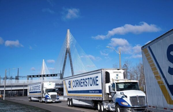 SK Cornerstone trucks and trailers on the Gordie Howe bridge