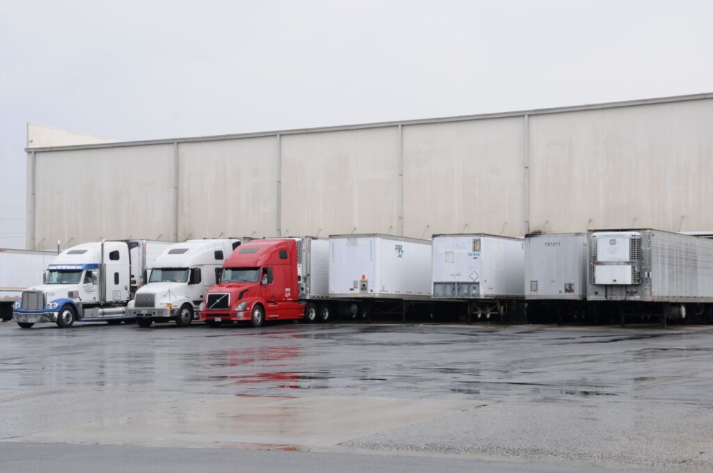 A truck backing in ayard