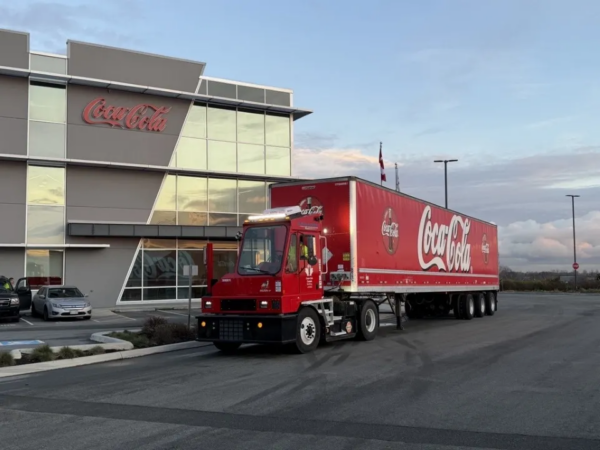 Coca-Cola Canada Bottling Picture of Orange EV yard terminal, branded