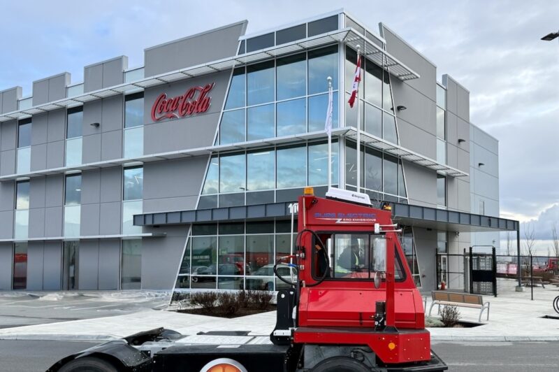 Coca-Cola Canada Bottling Picture of Orange EV yard terminal, branded
