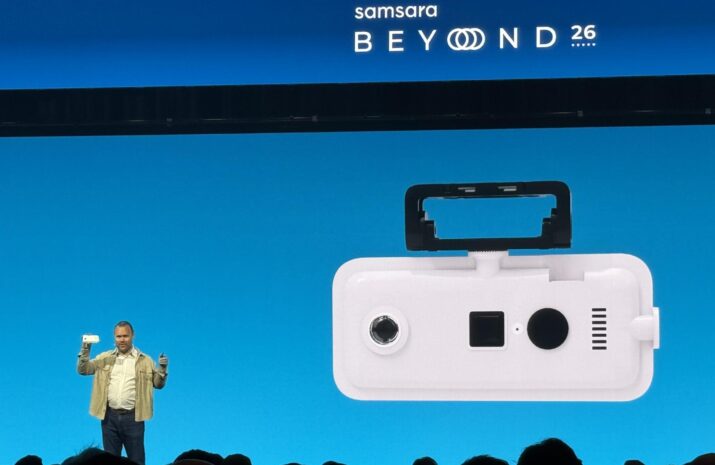 Johan Land on stage holding the new 360-degree camera during the presentation