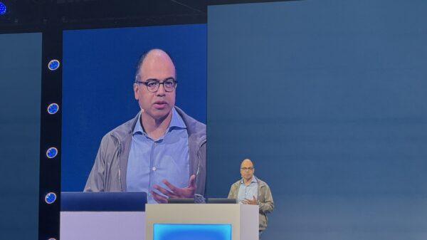 CEO Sanjit Biswas on stage