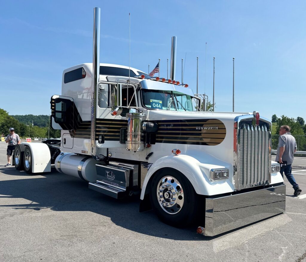White truck with brown stripes