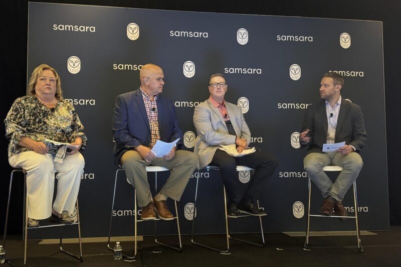 Four people on stage in front of Samsara-branded banner during the panel discussion