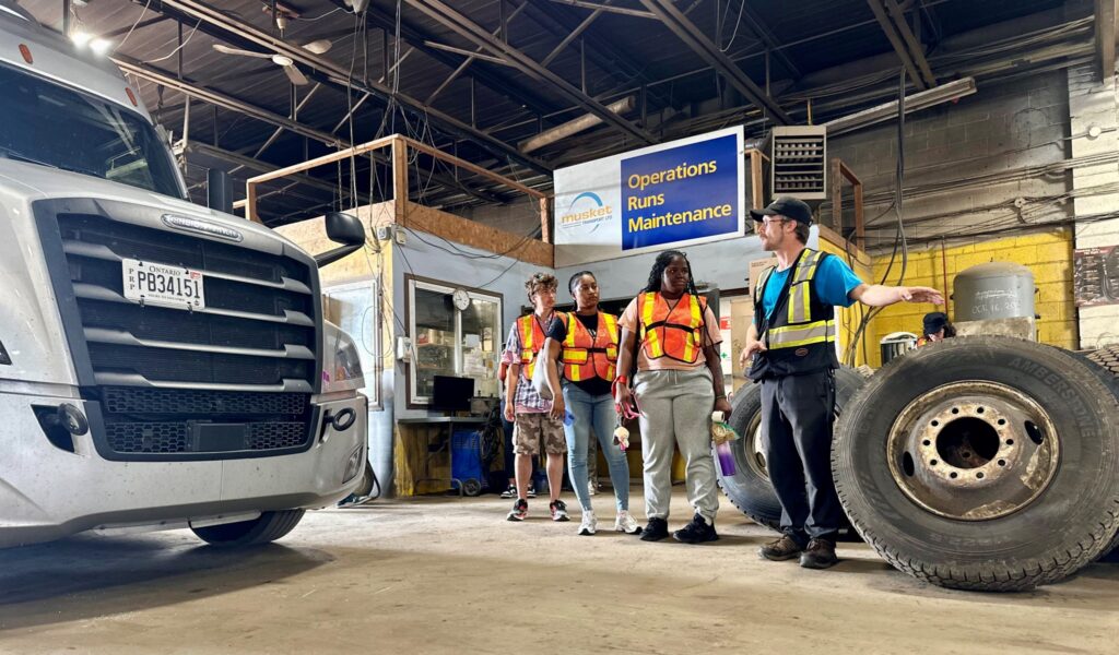 People in a truck shop