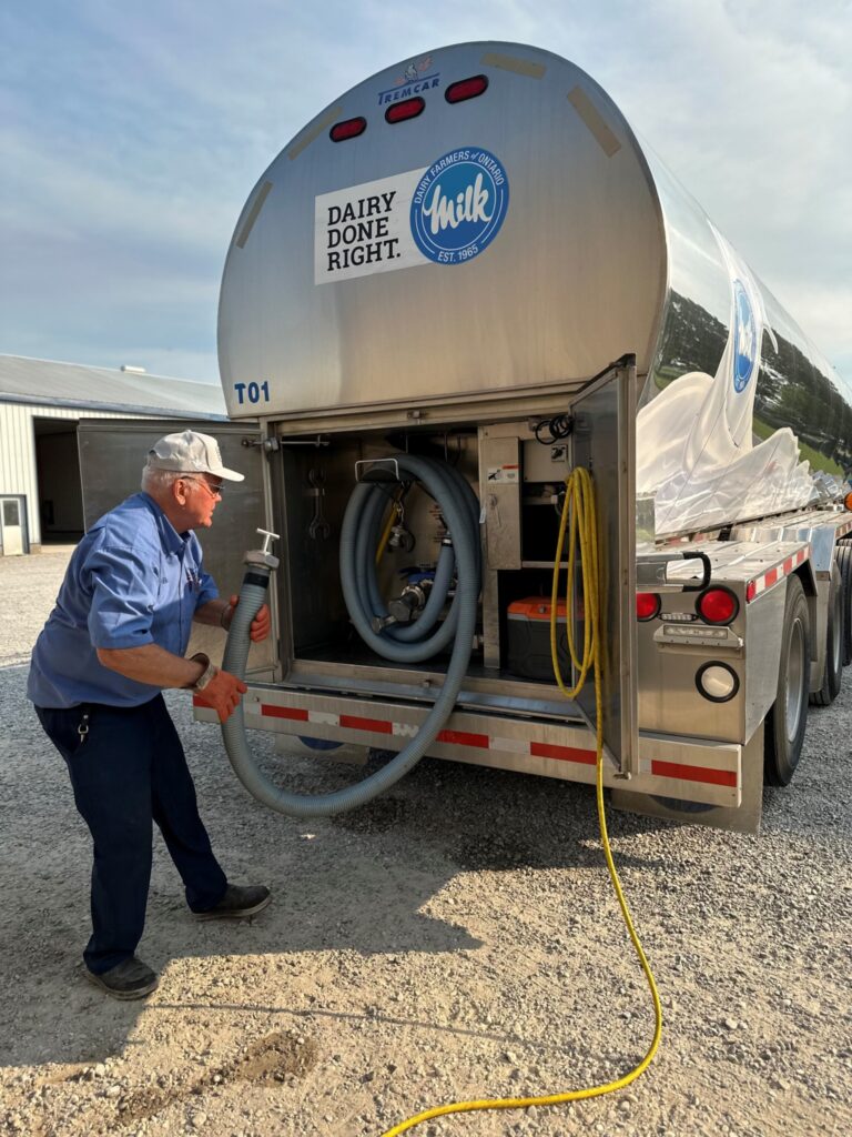 A driver stows a hose