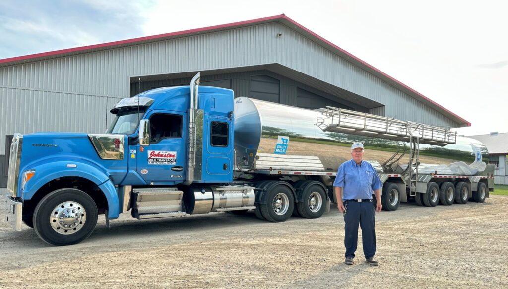 Driver in front of his truck