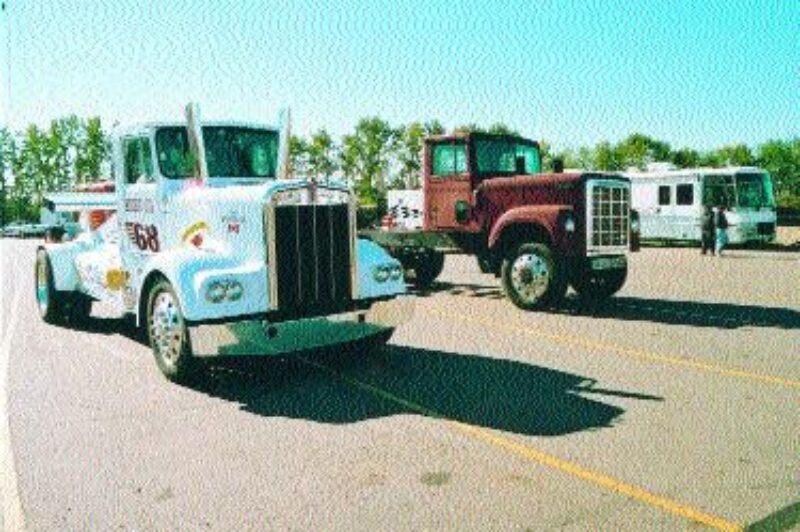 HEAD TO HEAD: The Smokin' Gun (left) outpaced the Cornfield Corvette, which has had a unique history, including a cab fire.Photo by James Menzies