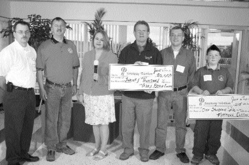 ST. JOHN'S, NFLD.: The 2004 Teddy Bear Convoy raised over $20,000 for the Janeway Children's Hospital of St John's, Nfld.On June 6 over 60 trucks circled the hospital to show support during this year's Janeway Telethon.(LtoR) Robert Wiseman of the Transportation Club of Newfoundland; Wilbert Collins of the Newfoundland and Labrador Independent Truckers Association and the organizer of the Convoy; Claudette Barnes, Telethon Host; Tom Rideout, Minister of Transportation and Works; Gord Peddle of the Newfoundland and Labrador Carriers Association; Mitchell Collins.n