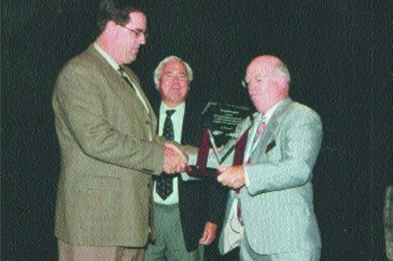 CONGRATS: Mark Seymour of Kriska Transportation was presented the Best Retention Practices for a Canadian Carrier Award at the 2004 Canadian Recruitment and Retention Conference. Pictured (from L to R) are Mark Seymour, Peter Charboneau and Rick Cooper. Photo by Katy de Vries