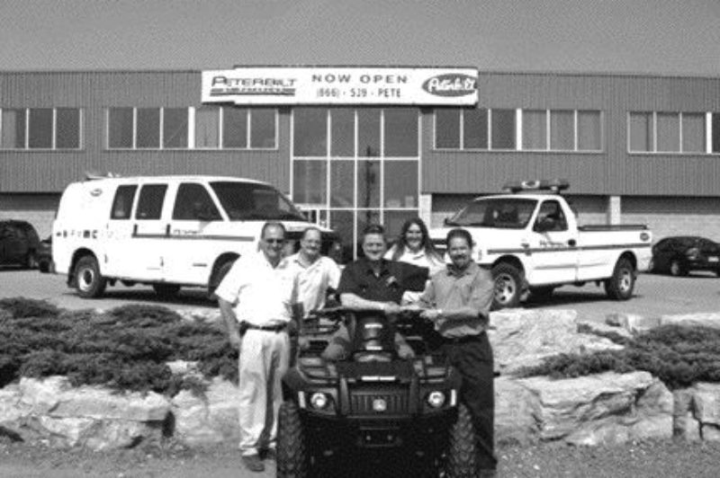 NEW DIGS: Peterbilt of Ontario recently opened a new dealership in Ayr. Pictured above (left to right) Brian Verbuyst, sales manager, Agraturf Equipment Services Inc., Bruce Ireland, service manager, Peterbilt of Waterloo, Basil Kelleher, fleet maintenance for E & E Seegmiller, Anna Burra, parts manager, Peterbilt of Waterloo and Paul Reitz, branch manager, Peterbilt of Waterloo.