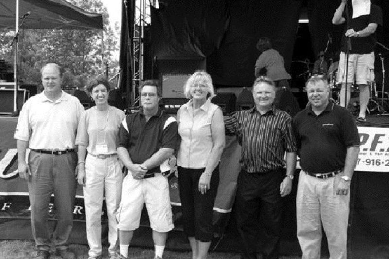 OUR HEROES: (Left to right)Brad Thiessen from Freightliner, Lynda Harvey from NRC, Mike Allen from Markel Professional Transport Training, Shirley and Herbie Walker, and Goodyear Canada's Don Diette. Photo by Adam Ledlow