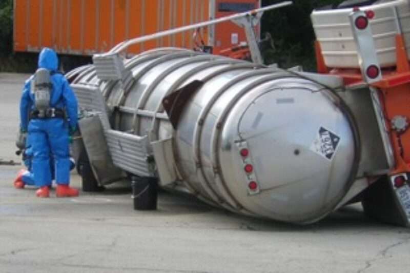 Emergency responders take part in a demonstration by Schneider National Bulk, involving a tanker rollover.