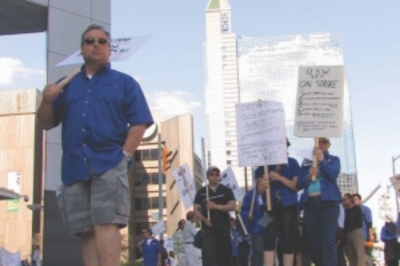 ON STRIKE: DriveTest staff bring attention to their cause during a demonstration in downtown Toronto Sept. 17.