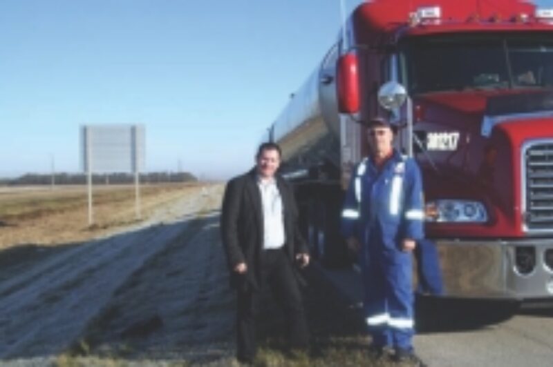 IMPRESSED: James Menzies (left) and pro driver Dave Medwid prepare to part ways after putting the UltraShift Plus MXP to the test under heavy load.