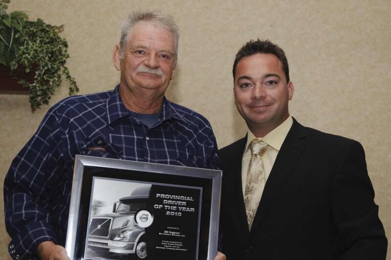 Bill Gagnon (left) was named Manitoba Driver of the Year. He receives his award from Kevin Schers.