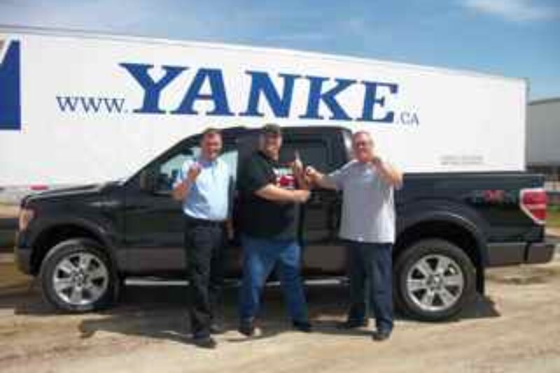 Pictured, from left to right is Bill Kalbhenn (director of fleet safety and recruiting), Brian Huggy Halabura (award-winning Yanke operator) and Craig Bailey (v.p. of YMS, YGLS, YSCS).