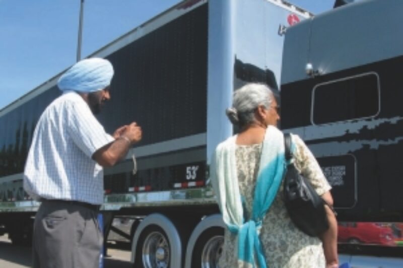 Picture time: Visitors to the Road Today Truck Show in Brampton take a few pictures at the show'n'shine competition.