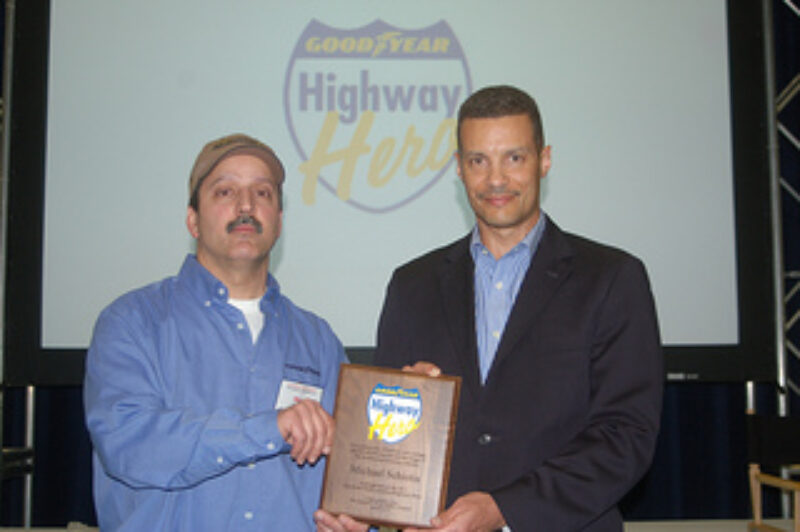2011 Goodyear North America Highway Hero Award winner Mike Schiotis (left), with Mark Pillow, director of business solutions, Goodyear Commercial Tire Systems. Schiotis, who saved a woman from a gun-wielding attacker, received the award at the Mid-America Trucking Show in Louisville, Ky.