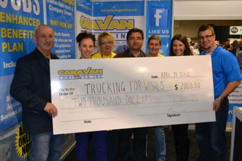 Caravan Logistics presents a cheque for $2,000 to the Trucking for Wishes charity at Truck World on April 21. From left to right: John Iwaniura (president), Ola Iwaniura (project manager), Jayne Gunn (recruiter manager), Bob Workun (vice-president), Helen Thorpe (Caravan city driver), Sonia Merena (inside marketing and sales), and Aaron Lindsay (Trucking for Wishes founder).