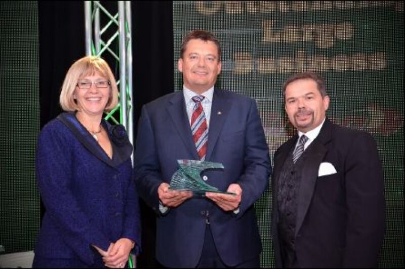 Bison's Rob Penner accepts an award from the Manitoba Chamber of Commerce, recognizing Bison as an Outstanding Large Business.