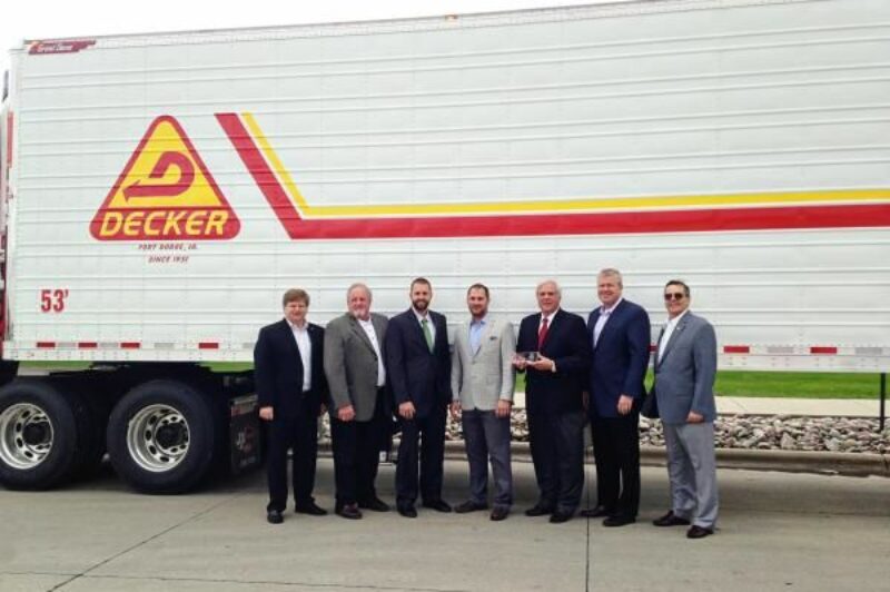 Great Dane recently built the 100,000th trailer out of its Wayne, Nebraska plant. Pictured (L-R): Chris Hammond, Great Dane Vice President of Dealer and International Sales; Darv Habben, Crossroads Trailer President; Mark Habben, Crossroads Trailer; Dale Decker, Decker Truck Line Vice President; Don Decker, President and CEO of Decker Truck Line; Dean Engelage, Great Dane President; Terry Hanson, Great Dane Wayne Plant Manager.