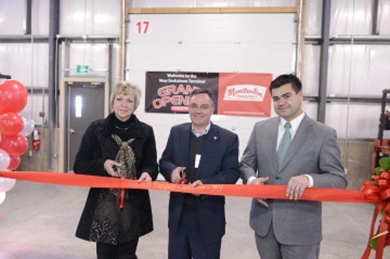 Judy Harwood, reeve of the Rural Municipality of Corman Park, Don Goodwill, president of Manitoulin Transport and Corey Tochor, MLA for Saskatoon Eastview cut the ribbon at the opening ceremony