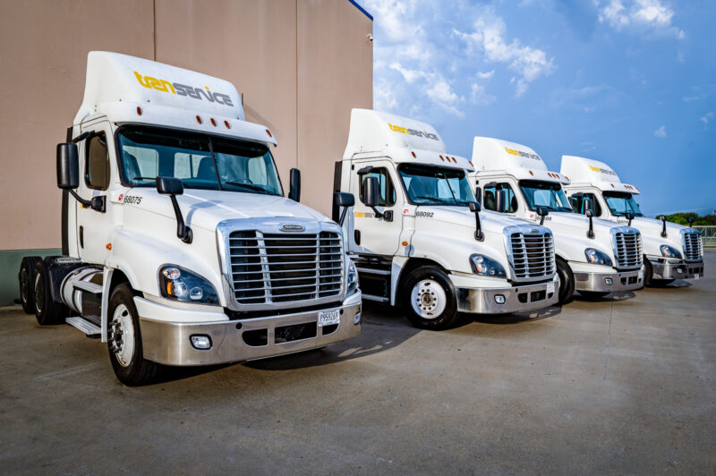 Transervice trucks in a line