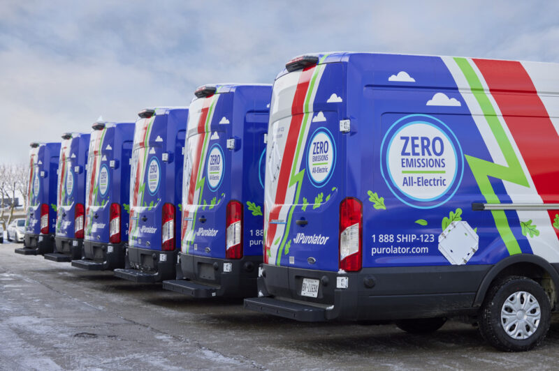 Purolator electric vehicle parked in a lot