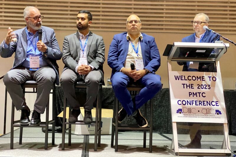 Four men on a stage