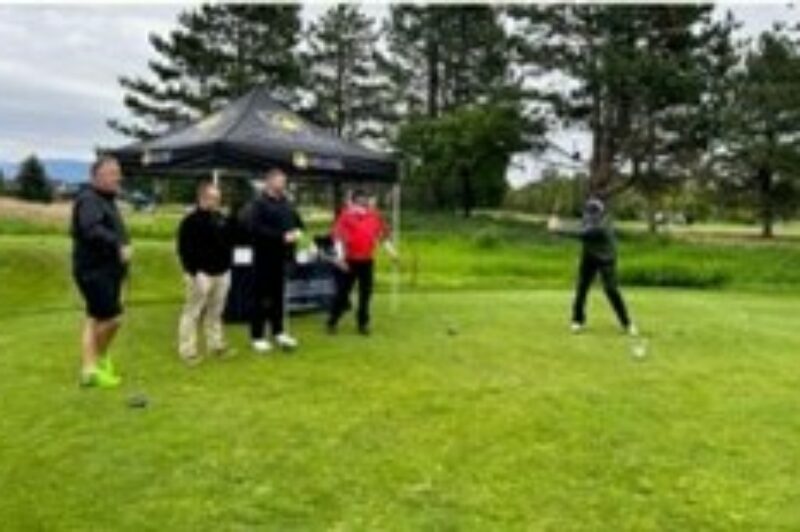 People playing golf
