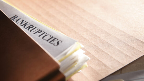 A file folder stuffed with paperwork pertaining to bankruptcy proceedings. Shot with shallow depth of field.To see more of my financial images click on the link below: