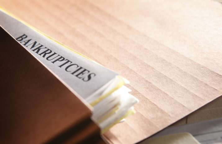 A file folder stuffed with paperwork pertaining to bankruptcy proceedings. Shot with shallow depth of field.To see more of my financial images click on the link below: